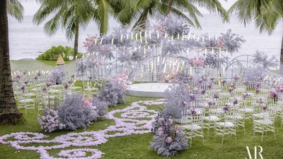 麦瑞婚礼MarryWedding  ：粉紫色系的海边目的地婚礼